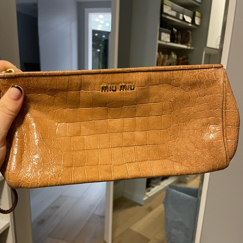 Miu miu leather camel clutch bag, used.